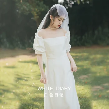 Pavasara jaunu franču baltā vienkāršu kleitu sieviešu Satīna mazo kleita līgava reģistrācijas Ceļojumu Foto Gaismas kāzu kleita